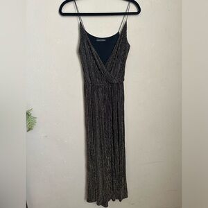 Black and gold Zara jumpsuit size M.